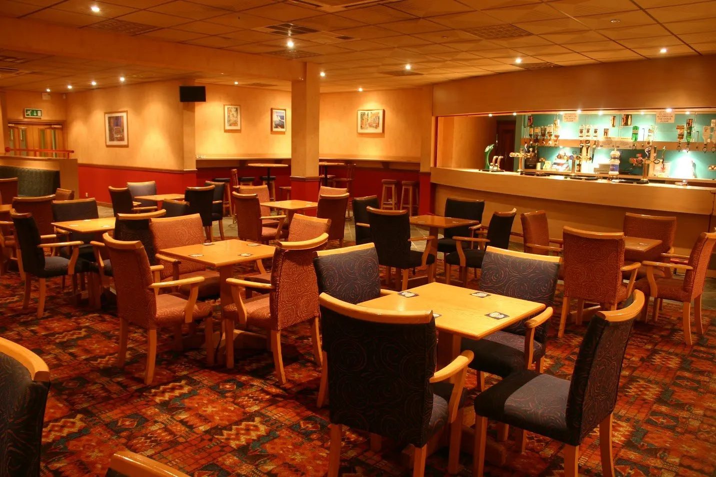 Standard Triumph Club function room with bar and seating area